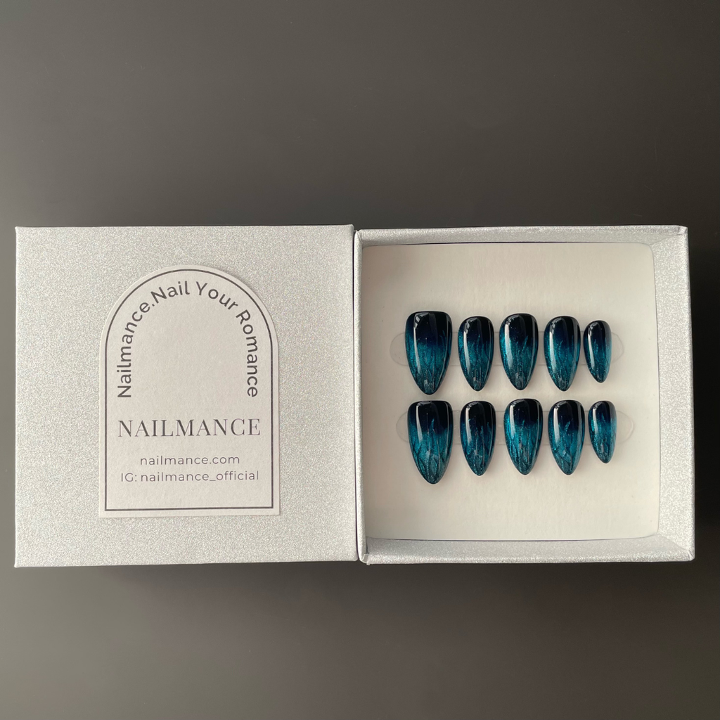 Icy Blue Flame Cat Eye Nails - Silent Storm Press-On Nails, presented in the signature NAILMANCE box