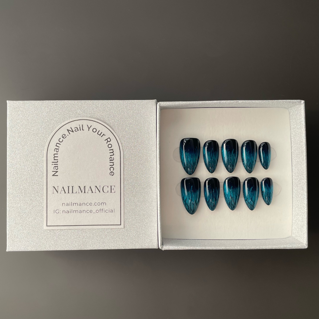 Icy Blue Flame Cat Eye Nails - Silent Storm Press-On Nails, presented in the signature NAILMANCE box